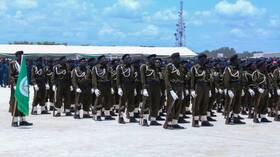 With wooden rifles and members of the rival groups.. Juba graduates the first batch of unified forces