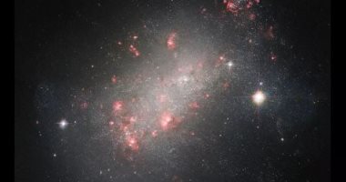 The Hubble Space Telescope captures a new image of a strangely shaped galaxy