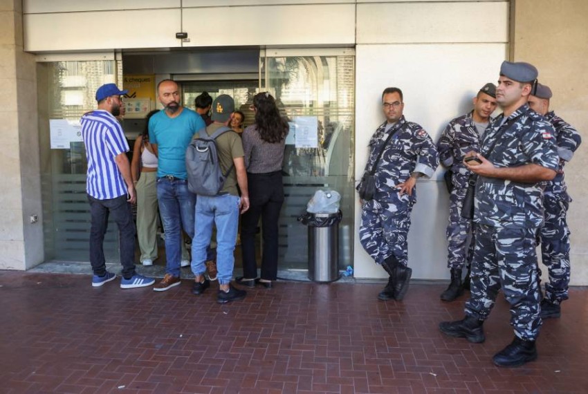 An armed Lebanese man storms a bank and takes hostages to get his deposit