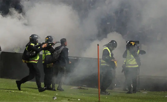 Indonesian police charge 6 people in stadium disaster