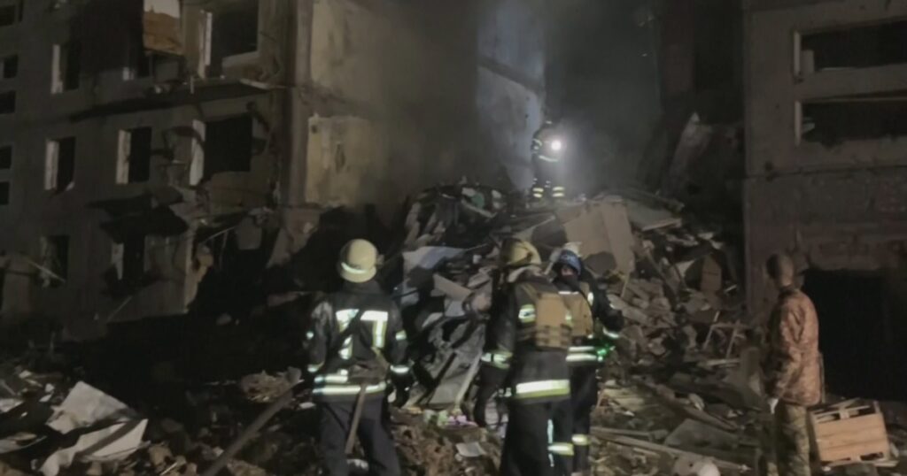 At least 12 dead after strike on Ukrainian apartment block