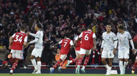 Arsenal beat Liverpool to regain top spot in the Premier League