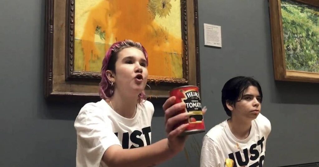 Climate protesters throw soup on Van Gogh’s Sunflowers painting