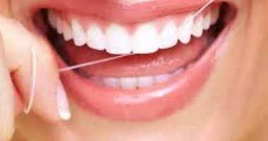 4 reasons to use the thread before brushing teeth .. including preventing gingivitis