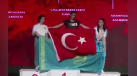 The struggle of the arms between Turkey and Kazakhstan players continues on the podium .. How did the problem solve?