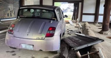 A stray car crashing the door of the oldest antique toilet in a Buddhist temple in Japan