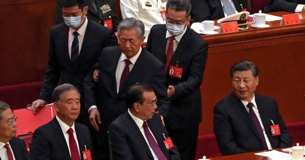 China’s former leader Hu Jintao escorted out of party congress