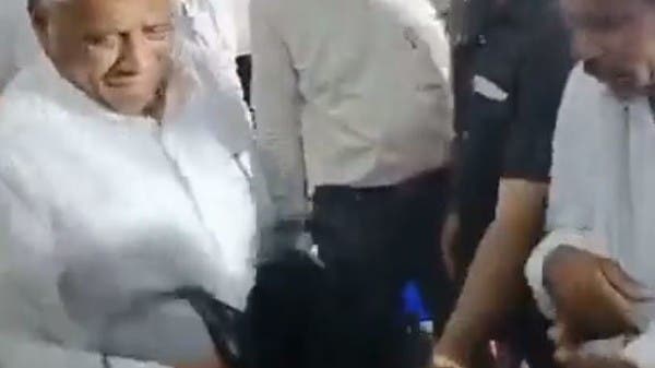 Watch .. an Indian minister slapped a woman who approached him with all his strength!