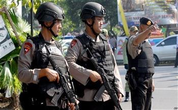 Indonesia .. The police arrest a woman carrying a pistol outside the presidential palace