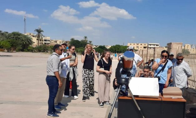 Visitors to Karnak Temples enjoy Egypt’s partial solar eclipse phenomenon