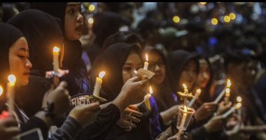 Candles stand in mourning for the victims of rioting at a soccer match in Indonesia.. Video