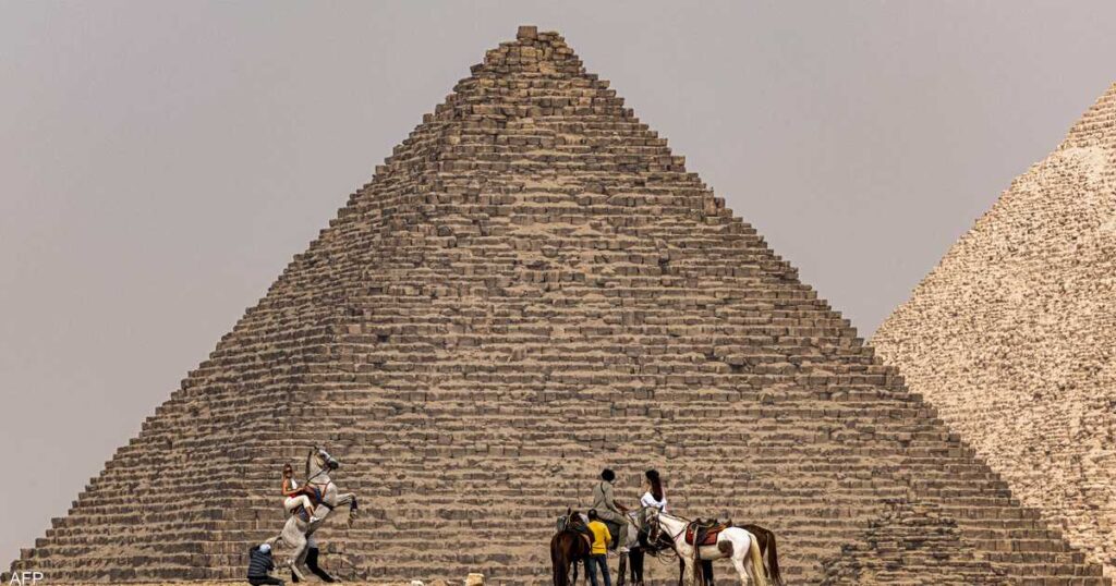 Photo reports “Forever is now” .. What does 12 international artists do at the pyramids?