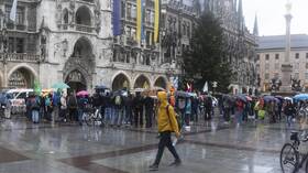 Germany .. steel workers organize a warning strike