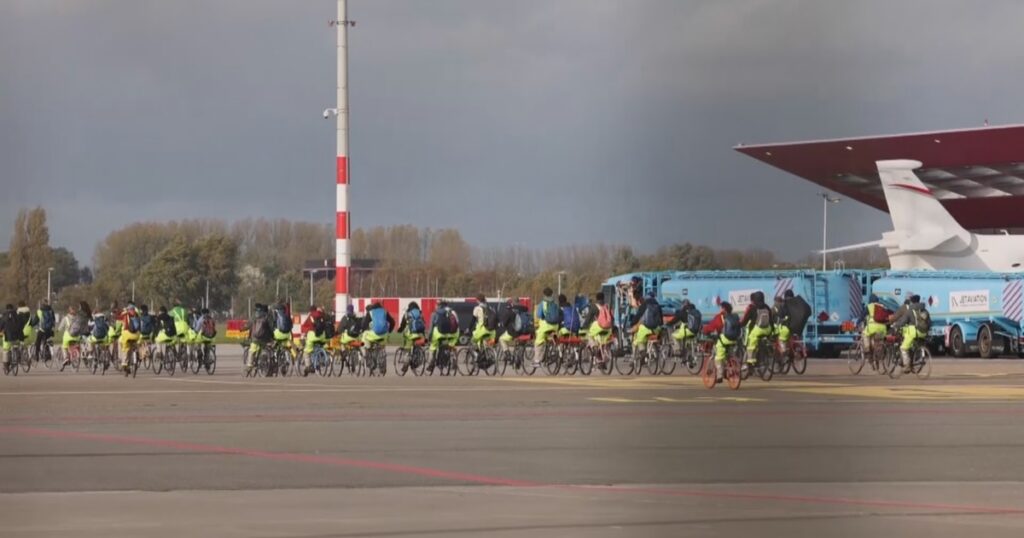 Bicycling climate activists block private jets at Amsterdam airport