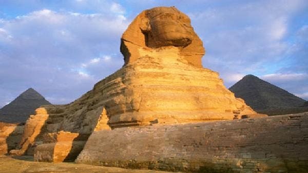 Egypt .. a tourist is stripped of clothes and modesty in front of the Sphinx