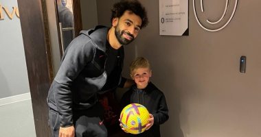 Stephen Gerrard’s son takes a picture with Mohamed Salah after Liverpool’s victory over Southampton