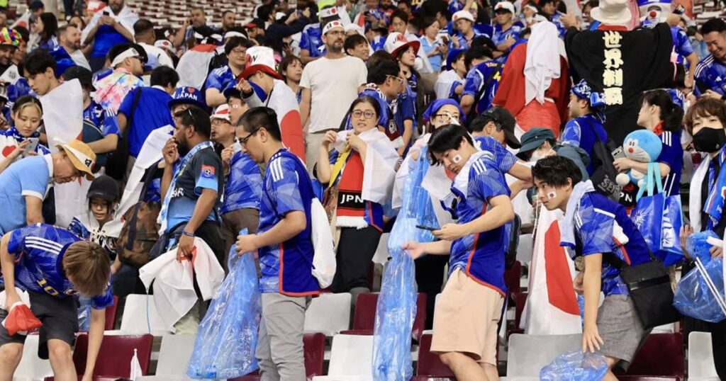 Japan fans praised for staying behind to clean Qatar stadiums