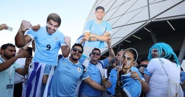 World Cup 2022 .. Uruguay fans appear with the Korea fans in the Arab dress “Tire”