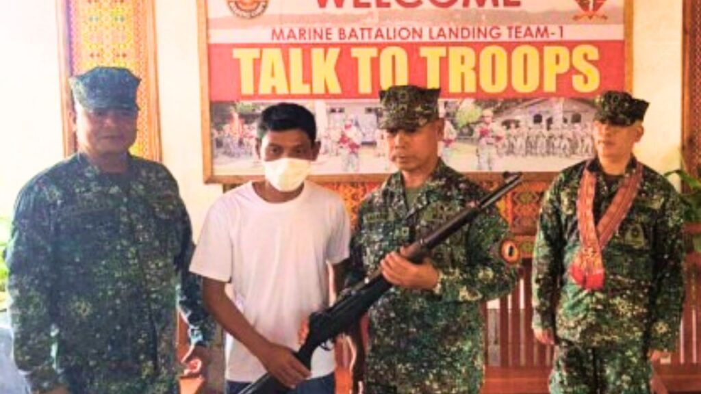 Members of the Abu Sayyaf group surrender to the authorities in Tawi Tawi Province in the Philippines